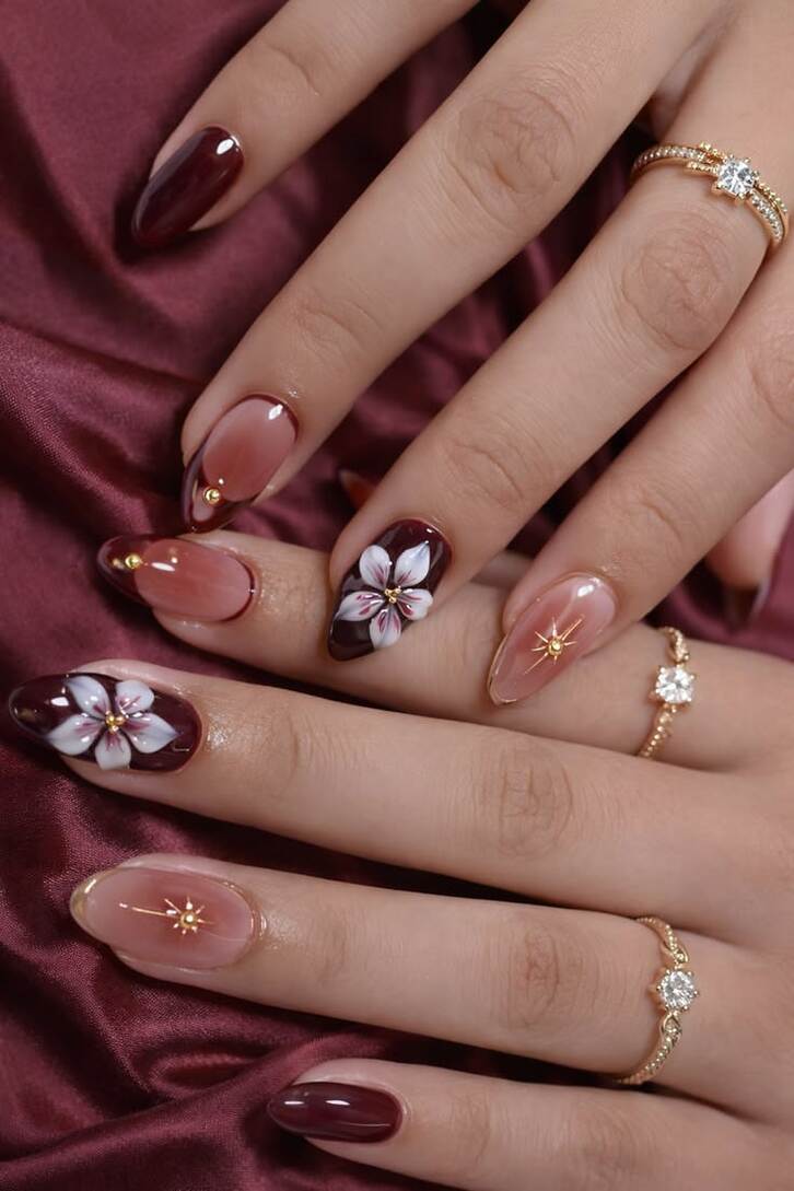 Mẫu nail màu đỏ rượu đính đá, tạo điểm nhấn lấp lánh